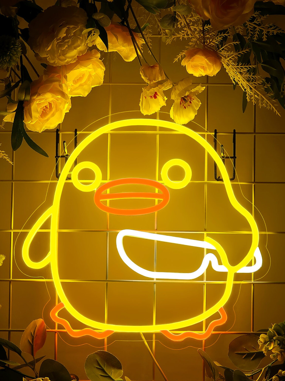 DUCKIE HOLDING KNIFE NEON SIGN